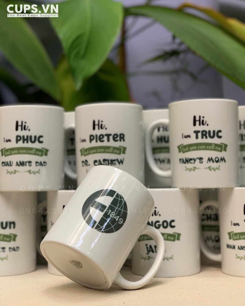 Custom premium mug with personalized names and Ecom Trading logo